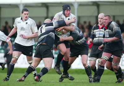 270405Neath v BedwasNeaths Cai Griffiths is held by the Bedwas defence