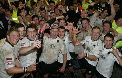 270405Neath v BedwasNeaths Gareth Morris celebrates with the team after being presented with the Premier League Trophy by David Pickering