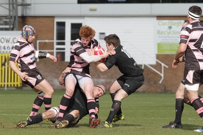 250212 - Neath v Cardiff - Welsh Premiership - Rhys Patchell of Cardiff is tackled by David Langdon of Neath