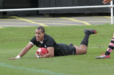 250212 - Neath v Cardiff - Welsh Premiership - Jamie Davies of Neath slides in for a try