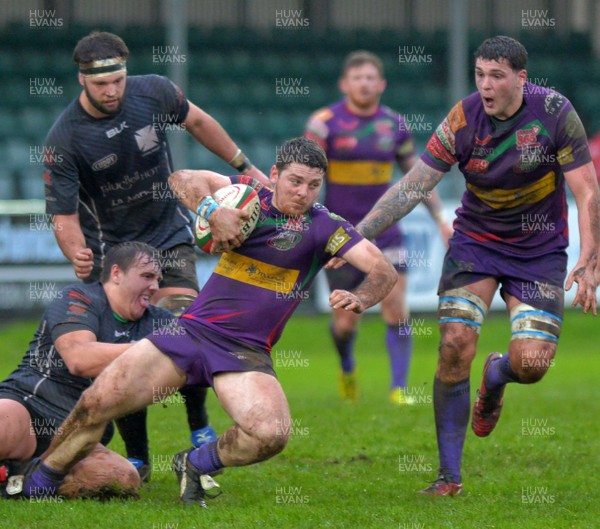 020116 - Neath v Ebbw Vale - Principality Premiership-Ebbw Vale's Ian Smerdon tackled by Neath's Ben Uphill