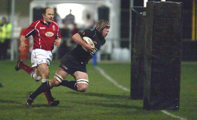 140203 - Neath v Llanelli - Welsh Premiership - Neath's Steve Tandy races in to score try