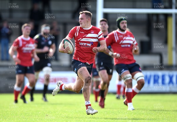 230917 - Neath v Llanelli - Principality Premiership - Ioan Nicholas of Llanelli gets clear to score try