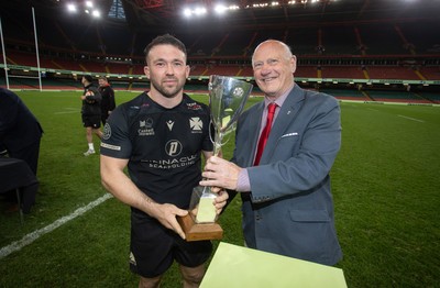 120426 - Neath v Merthyr - Mens Premiership Cup Final - Captain Ben Williams of Neath is presented the Cup by WRU President Terry Cobner