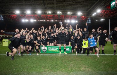 120426 - Neath v Merthyr - Mens Premiership Cup Final - Ben Williams lifts the trophy with his Neath team mates