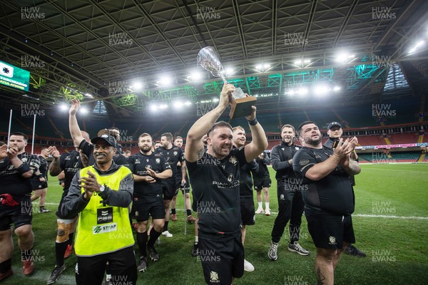 120426 - Neath v Merthyr - Mens Premiership Cup Final - Ben Williams lifts the trophy with his Neath team mates