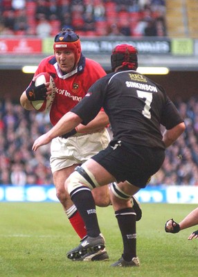 010203 - Neath v Munster - Celtic League Final -  Munster's Anthony Foley takes on Brett Sinkinson