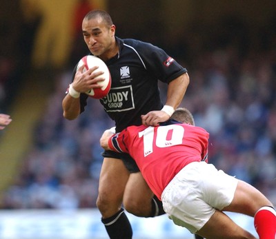 010203 - Neath v Munster - Celtic League Final - Neath's Dave Tiueti is caught by Ronan O'Gara