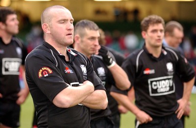 010203 - Neath v Munster - Celtic League Final - Neath's Lee Jarvis shuts his eyes as Munster celebrate