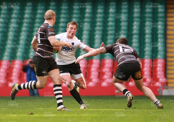 040513 Neath RFC v Pontypridd RFC -Neath's Aaron Bramwell takes on Pontypridd's Dafydd Lockyer