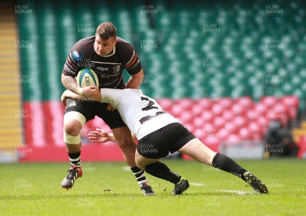 040513 Neath RFC v Pontypridd RFC -Pontypridd's Chris Phillips is tackled by Neath's Rhodri Clancy