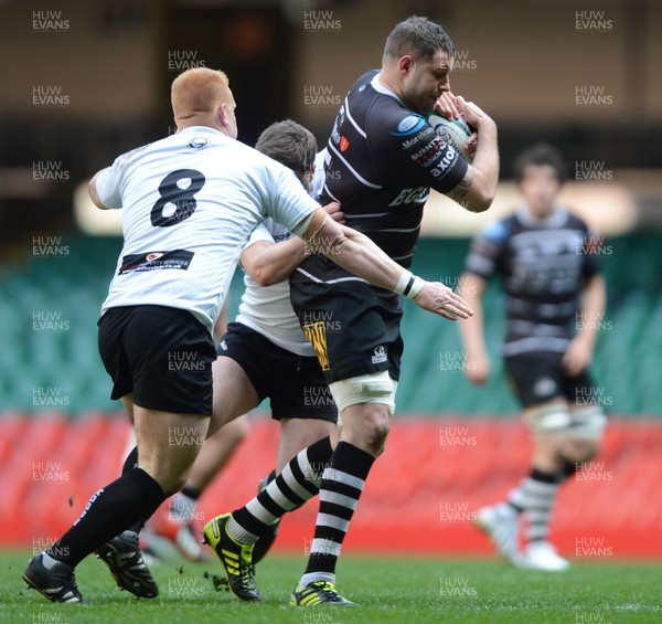 040513 - Neath v Pontypridd - SWALEC Cup Final -Chris Dicomidis of Pontypridd is tackled by Steffan Jonaes of Neath 