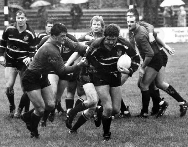 250988 - Neath v Pontypridd - Nic Saunders of Pontypridd breaks as Roland Phillips makes the tackle