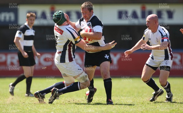 22.05.10 ... Neath v Swansea, Principality Premiership Play-Off Final 2010 -  Neath's Gareth Gravell hands off Swansea's James Goode 