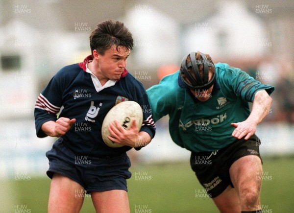 250395 - Neath v Swansea - Tony Clement of Swansea gets past Paul Thorburn