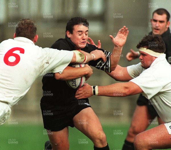 261096 - Neath v Ulster - Richard Jones of Neath is tackled by Stuart Duncan (left) and Richard Mackey