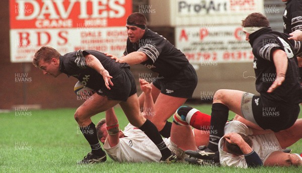 261096 - Neath v Ulster - Pat Horgan of Neath dives through tackled by Stuart Duncan