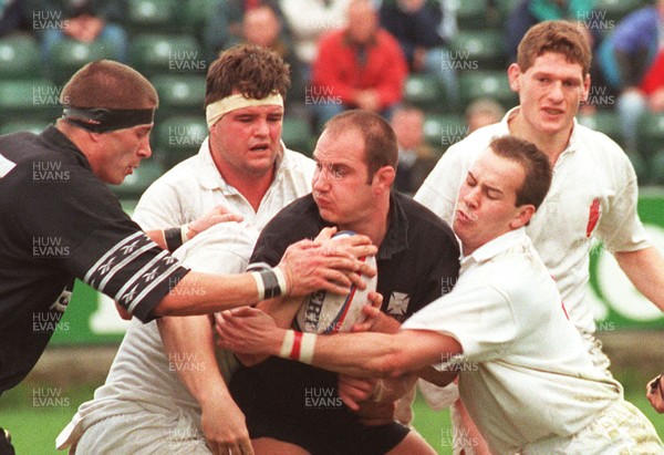 261096 - Neath v Ulster - Ian Boobyer of Neath is tackled by Andrew Matchett