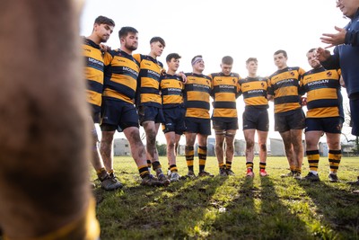 010325 - Nelson Nomads v Aberdare Athletic - WRU Athletic Mid District Division A - Aberdare team huddle during a grass roots game of rugby in Wales