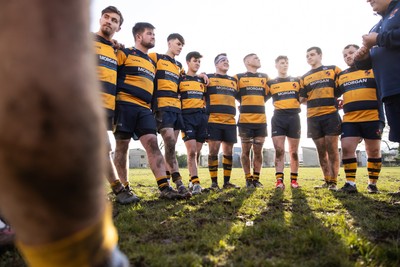 010325 - Nelson Nomads v Aberdare Athletic - WRU Athletic Mid District Division A - Aberdare team huddle during a grass roots game of rugby in Wales