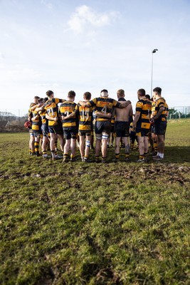 010325 - Nelson Nomads v Aberdare Athletic - WRU Athletic Mid District Division A - Aberdare team huddle during a grass roots game of rugby in Wales