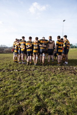 010325 - Nelson Nomads v Aberdare Athletic - WRU Athletic Mid District Division A - Aberdare team huddle during a grass roots game of rugby in Wales