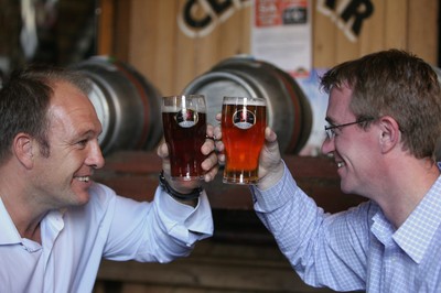 24.09.09 - Kilimanjaro Captains Climb... Cardiff based brewer SA Brain are developing a new beer to raise money for a climb of Kilimanjaro by 15 former captains of the Wales rugby team. One of the captains, Mike Hall called in at the Brewery in Cardiff to help decide on the taste and ingredients.He is photographed with Head Brewer Bill Dobson. 