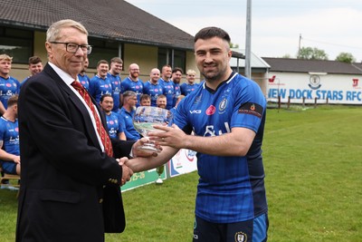 090526 - New Dock Stars - Admiral National League 3 West Trophy Presentation - Chris Jones of the WRU presents the trophy to Captain Jordan Williams 