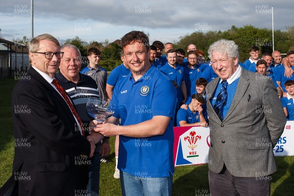 260425 - New Dock Stars League Trophy Presentation - Admiral National League 4 West B - WRU representative Chris Jones presents the trophy to New Dock Stars captain Jonny Harris