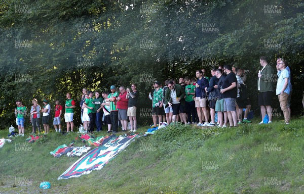 150721 The New Saints v Glentoran, UEFA Europa Conference League First Qualifying Round Second Leg - Glentoran fans watch the match from a bank outside the ground