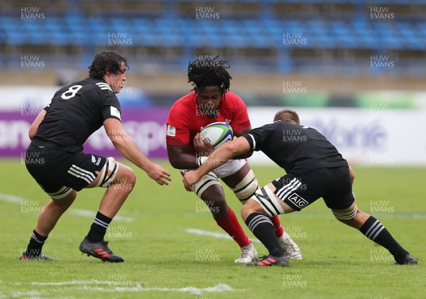 030618 - New Zealand U20 v Wales U20, World Rugby U20 Championship 2018, Pool A - Max Williams of Wales takes on Tom Christie of New Zealand and Devan Flanders of New Zealand