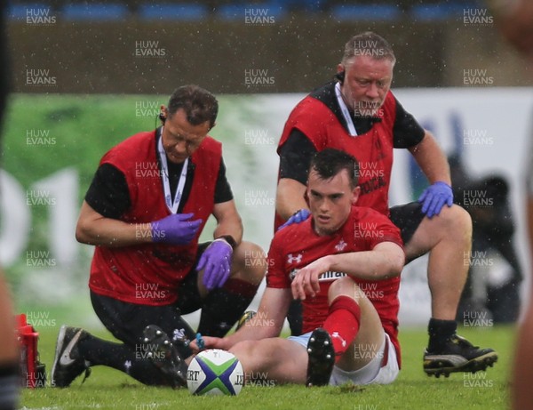 030618 - New Zealand U20 v Wales U20, World Rugby U20 Championship 2018, Pool A - Cai Evans of Wales receives treatment after a challenge