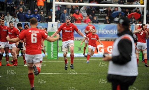 170619 - New Zealand U20 v Wales U20 - World Rugby Under 20 Championship - 5th Place Semi-Final -  Wales U20 players Jac Price (headguard) and Lennon Greggains (6) celebrate a famous victory over New Zealand U20 as the whistle blows for full time