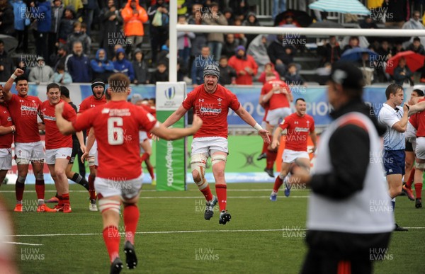 170619 - New Zealand U20 v Wales U20 - World Rugby Under 20 Championship - 5th Place Semi-Final -  Wales U20 players Jac Price (headguard) and Lennon Greggains (6) celebrate a famous victory over New Zealand U20 as the referee (far right) blows his whistle for full time