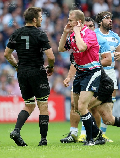 200915  - New Zealand vs Argentina -  IRB Rugby World Cup 2015 Group C -Referee Wayne Barnes with New Zealand captain Richie McCaw