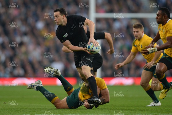 311015 - New Zealand v Australia - Rugby World Cup Final 2015 -Ben Smith of New Zealand is tackled by Israel Folau of Australia