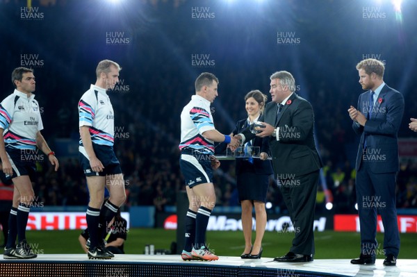 311015 - New Zealand v Australia - Rugby World Cup Final 2015 -Referee Nigel Owens receives his medal at the end of the game