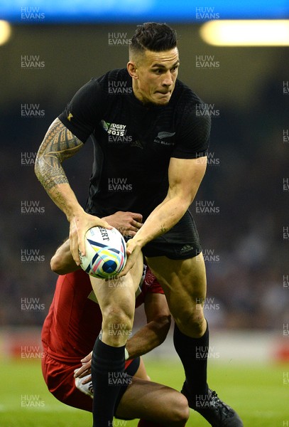 021015 - New Zealand v Fiji - Rugby World Cup 2015 -Sonny Bill Williams of New Zealand is tackled by Lasha Malaguradze of Georgia