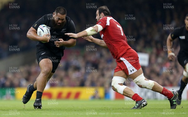 021015 - New Zealand v Georgia - Rugby World Cup - Charlie Faumuina of New Zealand is tackled by Mamuka Gorgodze of Georgia