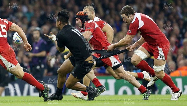 021015 - New Zealand v Georgia - Rugby World Cup - Julian Savea of New Zealand bares all as Shalva Sutiashvili of Georgia pulls him back by his underwear