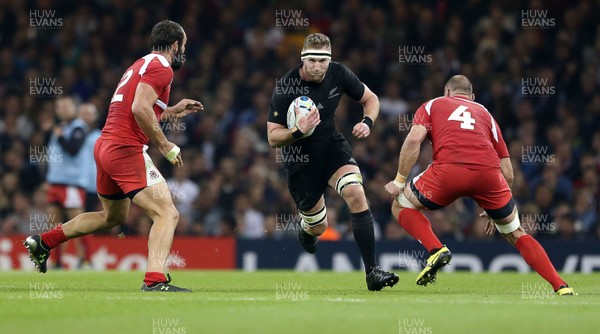 021015 - New Zealand v Georgia - Rugby World Cup - Kieran Read of New Zealand is tackled by Tamaz Mchedlidze and Levan Datunashvili of Georgia