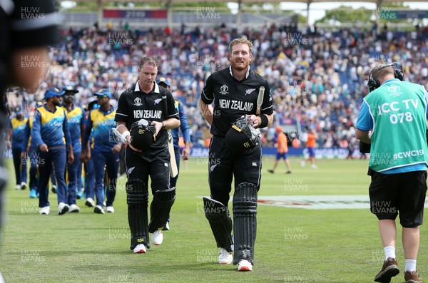 010619 - New Zealand v Sri Lanka - ICC Cricket Worls Cup 2019 - Colin Munro and Martin Guptill of New Zealand walk off the field after winning the game