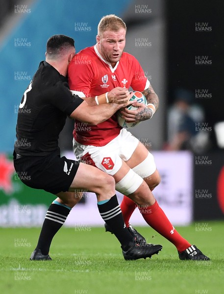 011119 - New Zealand v Wales - Rugby World Cup Bronze Final - Ross Moriarty of Wales is tackled by Ryan Crotty of New Zealand
