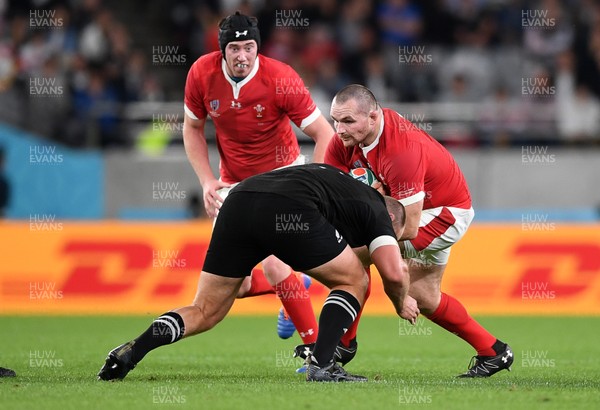 011119 - New Zealand v Wales - Rugby World Cup Bronze Final - Ken Owens of Wales is tackled by Joe Moody of New Zealand