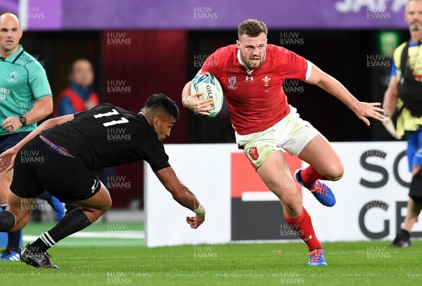 011119 - New Zealand v Wales - Rugby World Cup Bronze Final - Owen Lane of Wales is challenged by Rieko Ioane of New Zealand