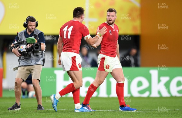 011119 - New Zealand v Wales - Rugby World Cup Bronze Final - Josh Adams of Wales celebrates scoring a try with Owen Lane