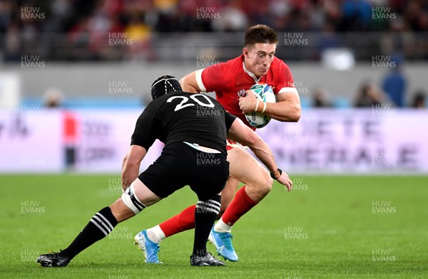 011119 - New Zealand v Wales - Rugby World Cup Bronze Final - Josh Adams of Wales is tackled by Matt Todd of New Zealand