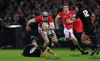 19.06.10 - New Zealand v Wales - 2010 Steinlager Series - Ryan Jones of Wales is tackled by Dan Carter of New Zealand. 