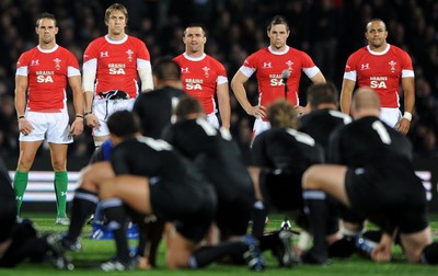 19.06.10 - New Zealand v Wales - 2010 Steinlager Series - Wales players look on as New Zealand perform the Haka. 