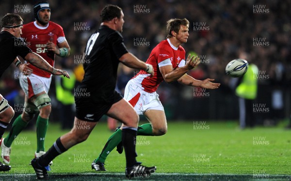 19.06.10 - New Zealand v Wales - 2010 Steinlager Series - Dan Biggar of Wales feeds the ball out. 